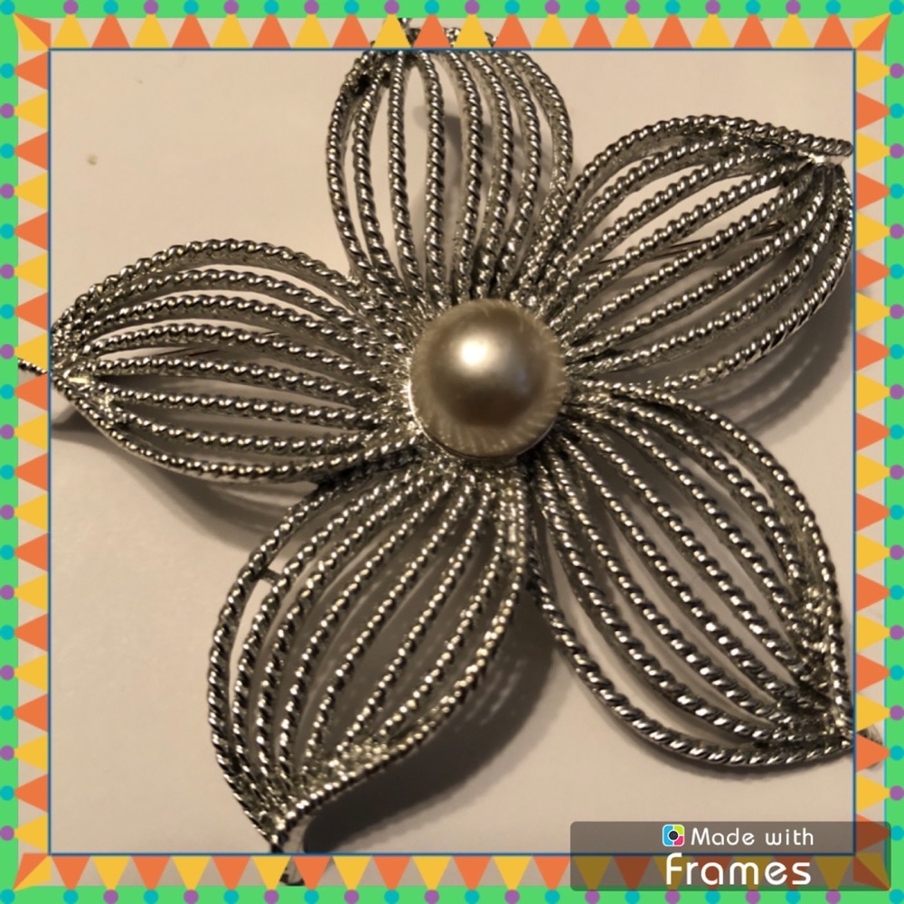 Large silvertone brooch with pearl